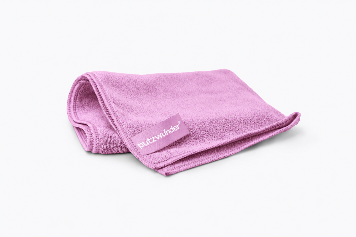 putzwunder Premium-Mikrofasertuch Rosa – gefaltet vor hellem Hintergrund